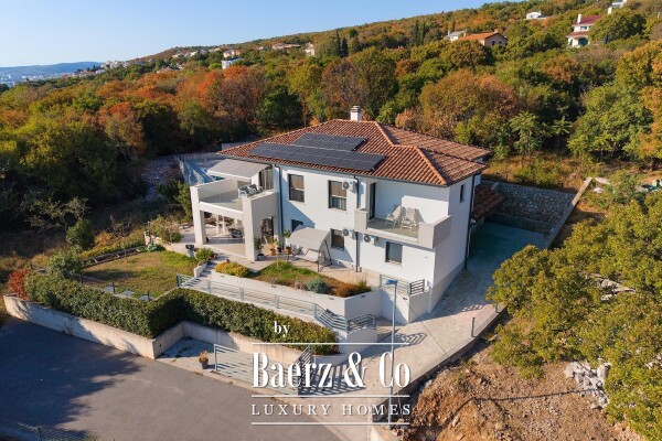 photo 1 Kostrena, a house with a swimming pool and a stunning open sea view